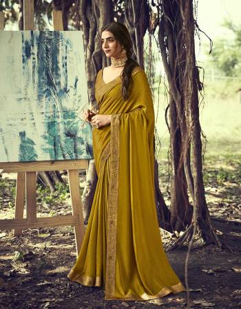 Adorn The Pretty Angelic Look Wearing This Heavy Look Saree In Color Paired With Contrasting Matching Broket Colored Blouse. This Saree Is Fabricated On Vichitra Silk Paired With Jacquard Broket Fabricated Blouse. Its Pretty Color Pallete Will Give An Attractive Look To Your Personality. 