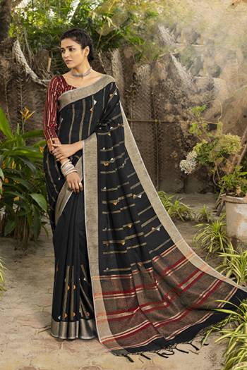 Look Attractive Wearing This Saree Paired With Contras Colored Blouse.  This Heavy Designer Saree Is Linen Silk Based Which Gives A Rich Look To Your Personality. Buy This Pretty Saree Now.
