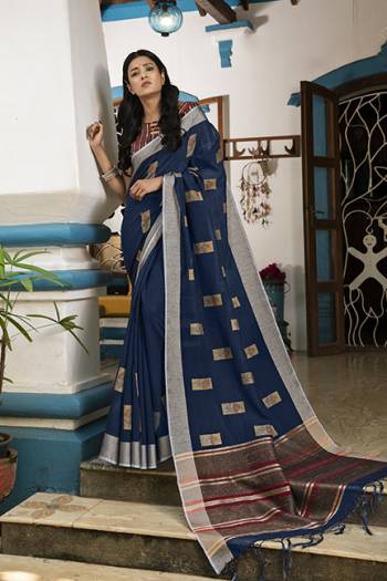 Look Attractive Wearing This Saree Paired With Contras Colored Blouse.  This Heavy Designer Saree Is Linen Silk Based Which Gives A Rich Look To Your Personality. Buy This Pretty Saree Now.