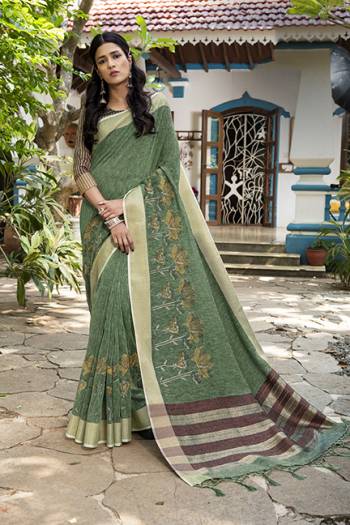 Look Attractive Wearing This Saree Paired With Contras Colored Blouse.  This Heavy Designer Saree Is Linen Silk Based Which Gives A Rich Look To Your Personality. Buy This Pretty Saree Now.