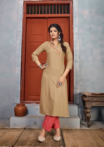 Grab This Readymade Long Kurti In Fine Color Fabricated On Rayon Beautified With Embroidery With Rayon Bottom . It Is Light In Weight And Easy To Carry All Day Long. 