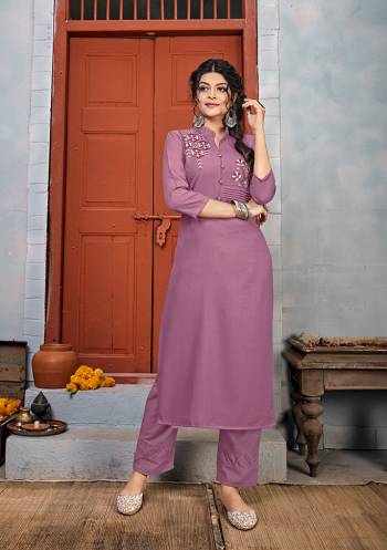 Grab This Readymade Long Kurti In Fine Color Fabricated On Rayon Beautified With Embroidery With Rayon Bottom . It Is Light In Weight And Easy To Carry All Day Long. 