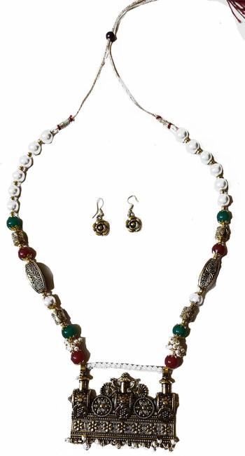 Give An Enhanced Look To Your Personality By Pairing Up This Beautiful Necklace Set With Your Ethnic Attire. This Pretty Set Is In Golden Color Beautified With Stone Work. Buy Now.