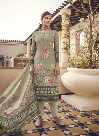 Simple And Elegant Suit Is Here For Your Casual Or Semi-Casual Wear. This Pretty Dress Materal Is In Pure Viscose Silk With Digital Print And Sequvance Embroidery. Its Cotton Jam Satin Paired Bottom And Pure Chinnon Digital Print Dupatta. 