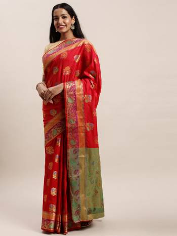 Look Attractive Wearing This Saree Paired With Blouse.  This Heavy Designer Saree Is Banarsi Silk Based With Jacquard WovenWhich Gives A Rich Look To Your Personality. Buy This Pretty Saree Now.