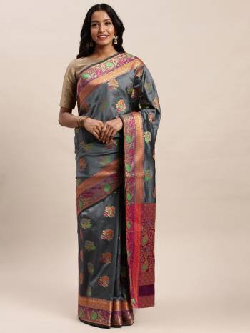 Look Attractive Wearing This Saree Paired With Blouse.  This Heavy Designer Saree Is Banarsi Silk Based With Jacquard WovenWhich Gives A Rich Look To Your Personality. Buy This Pretty Saree Now.