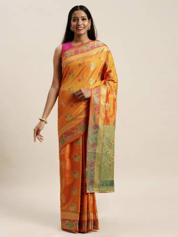 Look Attractive Wearing This Saree Paired With Blouse.  This Heavy Designer Saree Is Banarsi Silk Based With Jacquard WovenWhich Gives A Rich Look To Your Personality. Buy This Pretty Saree Now.