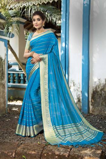 Adorn The Pretty Angelic Look Wearing This Heavy Designer Saree In Fancy Color Paired With Contrasting Colored Blouse. This Saree Is Fabricated On Nylon Silk Wevon Paired With Nylon  Silk Wevon Fabricated Blouse. Its Pretty Color Pallete Will Give An Attractive Look To Your Personality. 