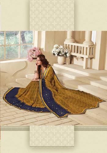 Look Attractive Wearing This Fine Colored Saree Paired With Canected Colored Blouse With Lace Border.  This Heavy Designer Saree Is Georgette Based Which Gives A Rich Look To Your Personality. Buy This Pretty Saree Now.