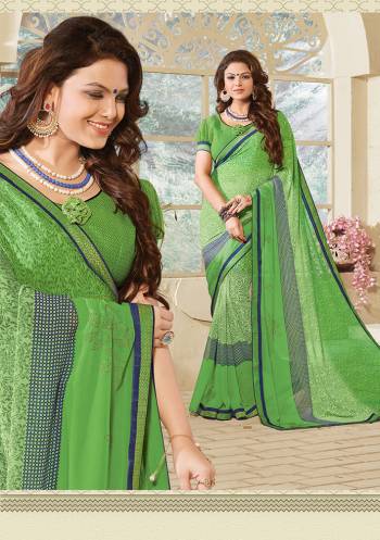 Look Attractive Wearing This Fine Colored Saree Paired With Canected Colored Blouse With Lace Border.  This Heavy Designer Saree Is Georgette Based Which Gives A Rich Look To Your Personality. Buy This Pretty Saree Now.