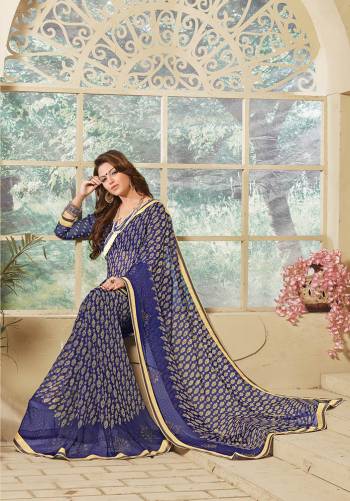 Look Attractive Wearing This Fine Colored Saree Paired With Canected Colored Blouse With Lace Border.  This Heavy Designer Saree Is Georgette Based Which Gives A Rich Look To Your Personality. Buy This Pretty Saree Now.