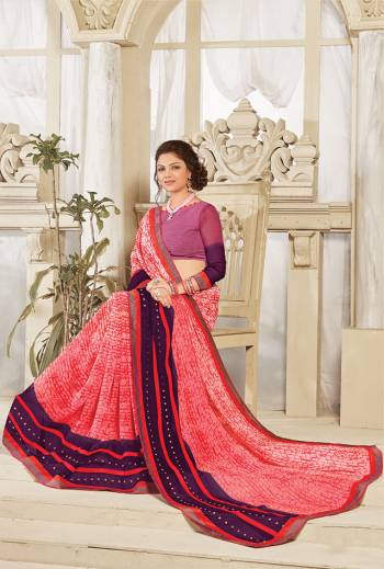 Look Attractive Wearing This Fine Colored Saree Paired With Canected Colored Blouse With Lace Border.  This Heavy Designer Saree Is Georgette Based Which Gives A Rich Look To Your Personality. Buy This Pretty Saree Now.