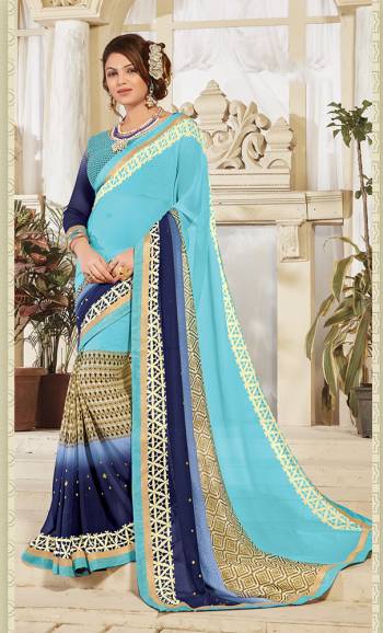 Look Attractive Wearing This Fine Colored Saree Paired With Canected Colored Blouse With Lace Border.  This Heavy Designer Saree Is Georgette Based Which Gives A Rich Look To Your Personality. Buy This Pretty Saree Now.