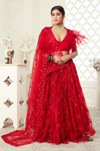 Heavy Designer Lehenga Choli In Red Color Fabricated On Net Beautified With Heavy Attractive Embroidery. 