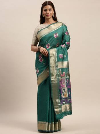 Look Attractive Wearing This Wevon Saree Paired With Maching Colored Blouse.  This Heavy Designer Saree Is Chanderi Cotton Based Which Gives A Rich Look To Your Personality. Buy This Pretty Saree Now.