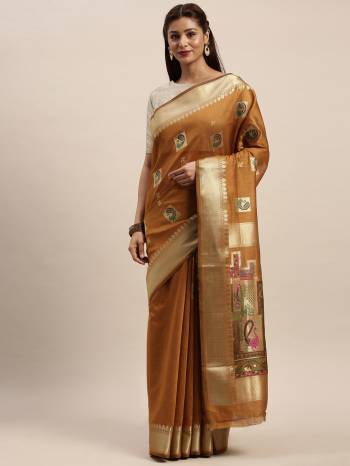 Look Attractive Wearing This Wevon Saree Paired With Maching Colored Blouse.  This Heavy Designer Saree Is Chanderi Cotton Based Which Gives A Rich Look To Your Personality. Buy This Pretty Saree Now.