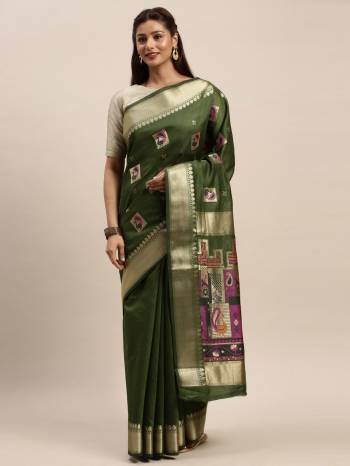 Look Attractive Wearing This Wevon Saree Paired With Maching Colored Blouse.  This Heavy Designer Saree Is Chanderi Cotton Based Which Gives A Rich Look To Your Personality. Buy This Pretty Saree Now.