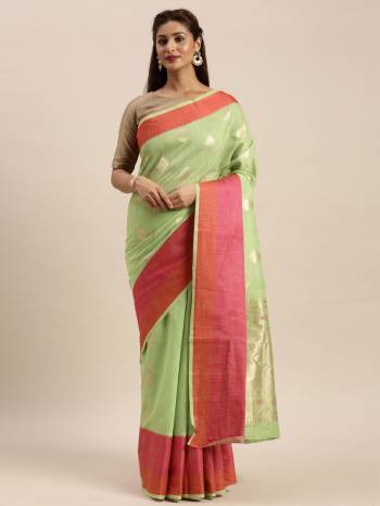 Celebrate This Festive Season In This Very Pretty Colored Designer Saree Paired With Contrasting Colored Blouse. This Saree and Blouse Are Linen Silk Based Beautified With Detailed Wevon Design. 