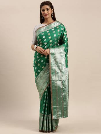 Adorn The Pretty Angelic Look Wearing This Heavy Designer Saree In Color Paired With Contrasting Colored Blouse. This Saree Is Fabricated On Soft Silk Paired With Soft Silk Fabricated Blouse. Its Pretty Color Pallete Will Give An Attractive Look To Your Personality. 