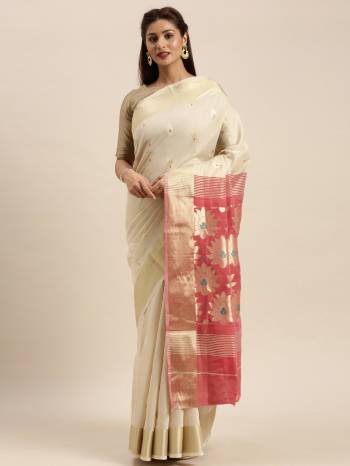 Look Attractive Wearing This White Colored Saree Paired With Pink Base Colored Blouse.  This Heavy Designer Saree Is Cotton Based Wevon Design Which Gives A Rich Look To Your Personality. Buy This Pretty Saree Now.