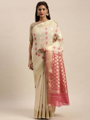 Look Attractive Wearing This White Colored Saree Paired With Pink Base Colored Blouse.  This Heavy Designer Saree Is Cotton Based Wevon Design Which Gives A Rich Look To Your Personality. Buy This Pretty Saree Now.