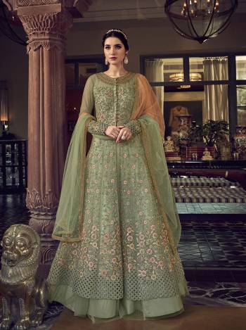 Grab This Pretty Designer Suit In Light Base Color For The Upcoming Festive And Wedding Season. Its Top Is Butterfly Nett Based Paired With Are Silk Bottom And Butterfly Nett Fabricated Dupatta. It Is Beautified With Designer Heavy Embroidery And Stone Work. Buy Now. 

