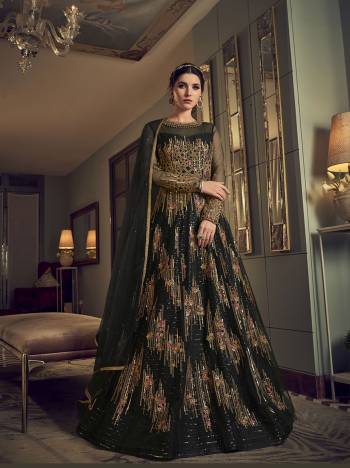 Grab This Pretty Designer Suit In Light Base Color For The Upcoming Festive And Wedding Season. Its Top Is Butterfly Nett Based Paired With Are Silk Bottom And Butterfly Nett Fabricated Dupatta. It Is Beautified With Designer Heavy Embroidery And Stone Work. Buy Now. 

