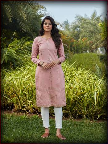 Grab This Readymade Long Kurti In Fine Color Fabricated On Silky Cotton Beautified With Mukaish Work. It Is Light In Weight And Easy To Carry All Day Long. 