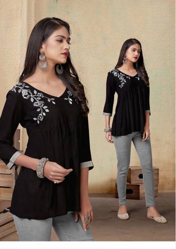 Grab This Readymade Short Kurti In Fine Color Fabricated On Rayon Beautified With Embroidery Work. It Is Light In Weight And Easy To Carry All Day Long. 