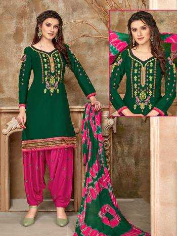 Rich And Elegant Looking Designer Patiala Suit Is Here In Fine Colored Top Paired With Maching Colored Bottom And Dupatta. Its Top Is Fabricated On Glaze Cotton Paired With Cotton Bottom And Naznin Fabricated Dupatta. Buy This Lovely Suit Now. 

