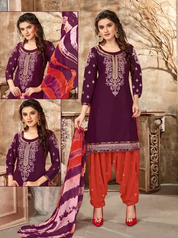 Rich And Elegant Looking Designer Patiala Suit Is Here In Fine Colored Top Paired With Maching Colored Bottom And Dupatta. Its Top Is Fabricated On Glaze Cotton Paired With Cotton Bottom And Naznin Fabricated Dupatta. Buy This Lovely Suit Now. 

