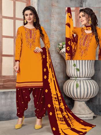 Rich And Elegant Looking Designer Patiala Suit Is Here In Fine Colored Top Paired With Maching Colored Bottom And Dupatta. Its Top Is Fabricated On Glaze Cotton Paired With Cotton Bottom And Naznin Fabricated Dupatta. Buy This Lovely Suit Now. 

