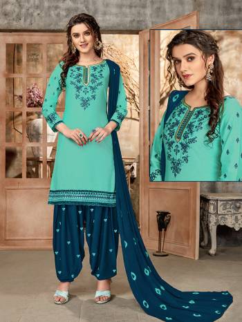 Rich And Elegant Looking Designer Patiala Suit Is Here In Fine Colored Top Paired With Maching Colored Bottom And Dupatta. Its Top Is Fabricated On Glaze Cotton Paired With Cotton Bottom And Naznin Fabricated Dupatta. Buy This Lovely Suit Now. 

