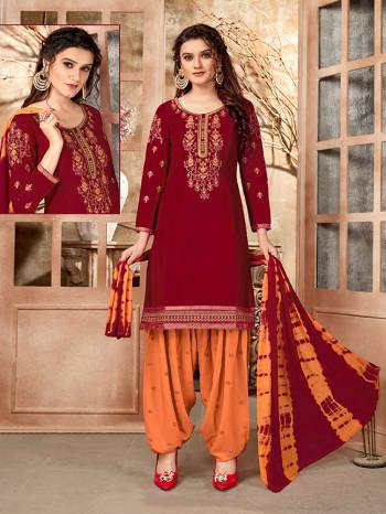 Rich And Elegant Looking Designer Patiala Suit Is Here In Fine Colored Top Paired With Maching Colored Bottom And Dupatta. Its Top Is Fabricated On Glaze Cotton Paired With Cotton Bottom And Naznin Fabricated Dupatta. Buy This Lovely Suit Now. 

