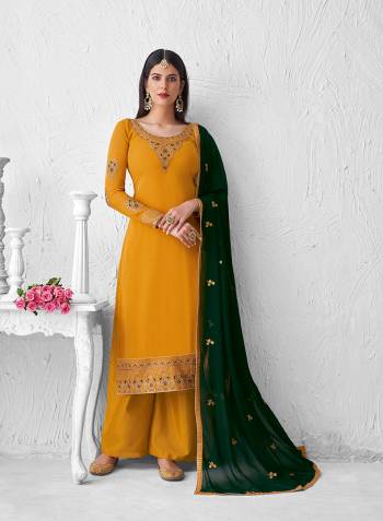 Look Pretty This Designer Floor Length Suit In Lovely  Color.?Its Pretty Embroidred Top Is Faux Georgette Based Paired With Santoon Bottom And Faux Georgette Fabricated Embroidered Dupatta Which Gives An Attractive To The Suit.