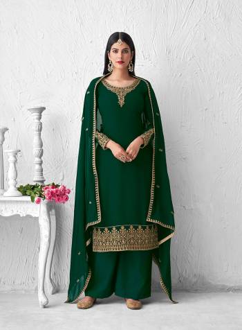 Look Pretty This Designer Floor Length Suit In Lovely  Color.?Its Pretty Embroidred Top Is Faux Georgette Based Paired With Santoon Bottom And Faux Georgette Fabricated Embroidered Dupatta Which Gives An Attractive To The Suit.