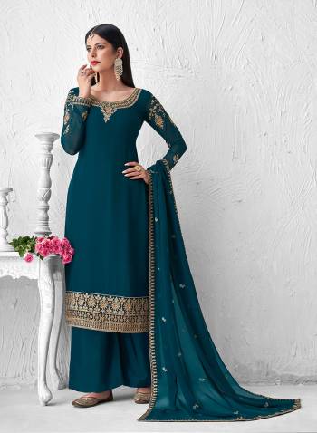 Look Pretty This Designer Floor Length Suit In Lovely  Color.?Its Pretty Embroidred Top Is Faux Georgette Based Paired With Santoon Bottom And Faux Georgette Fabricated Embroidered Dupatta Which Gives An Attractive To The Suit.