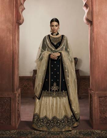 Beautiful looks in this Black COLOR fabric faux georgette with inner  and GHARARA semi stiched type and bottom chudidar style suit with embroidered floral patterns on the yoke and sleeves. Comes with matching net dupatta