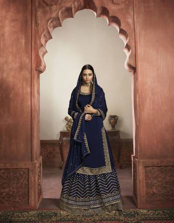 Beautiful looks in this Nevy blue COLOR fabric Rangoli georgette with inner  and GHARARA semi stiched type and bottom chudidar style suit with embroidered floral patterns on the yoke and sleeves. Comes with matching net dupatta