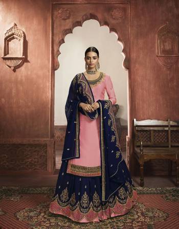 Beautiful looks in this Pink COLOR fabric georgette satin with inner  and GHARARA semi stiched type and bottom chudidar style suit with embroidered floral patterns on the yoke and sleeves. Comes with matching net dupatta