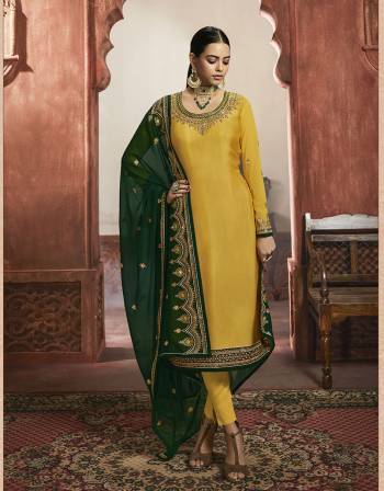 Beautiful looks in this Yellow COLOR fabric georgette satin with inner  and GHARARA semi stiched type and bottom chudidar style suit with embroidered floral patterns on the yoke and sleeves. Comes with matching net dupatta