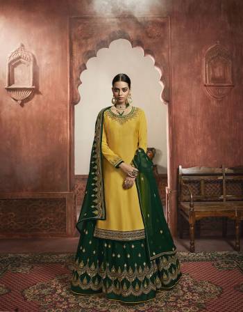 Beautiful looks in this Yellow COLOR fabric georgette satin with inner  and GHARARA semi stiched type and bottom chudidar style suit with embroidered floral patterns on the yoke and sleeves. Comes with matching net dupatta