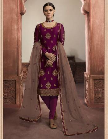 Beautiful looks in this Wine COLOR fabric Rangoli georgette with inner  and GHARARA semi stiched type and bottom chudidar style suit with embroidered floral patterns on the yoke and sleeves. Comes with matching net dupatta