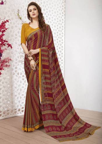 Adorn The Pretty Angelic Look Wearing This Heavy Designer Saree In Red Color Paired With Contrasting Yellow Colored Blouse. This Saree Is Fabricated On Satin Silk Paired With Art Silk Fabricated Blouse. Its Pretty Color Pallete Will Give An Attractive Look To Your Personality. 