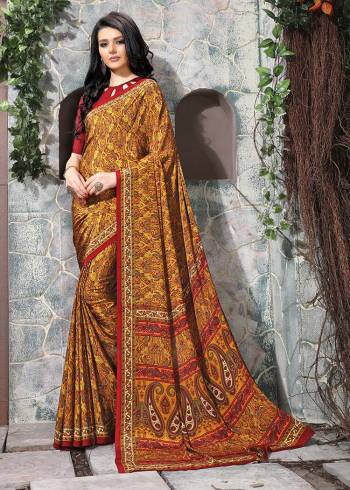 Celebrate This Festive Season In This Very Nyce Colored Saree Paired with Maching Blouse. This Saree and Blouse Are Crepe Silk Based Beautified With Detailed Fancy Print Saree. 