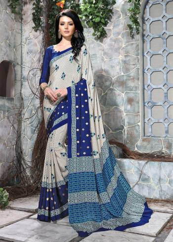 Celebrate This Festive Season In This Very Nyce Colored Saree Paired with Maching Blouse. This Saree and Blouse Are Crepe Silk Based Beautified With Detailed Fancy Print Saree. 