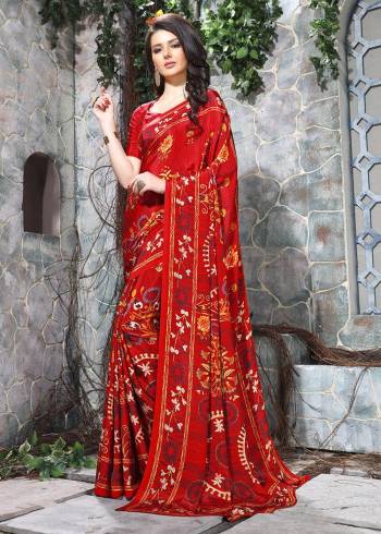 Celebrate This Festive Season In This Very Nyce Colored Saree Paired with Maching Blouse. This Saree and Blouse Are Crepe Silk Based Beautified With Detailed Fancy Print Saree. 