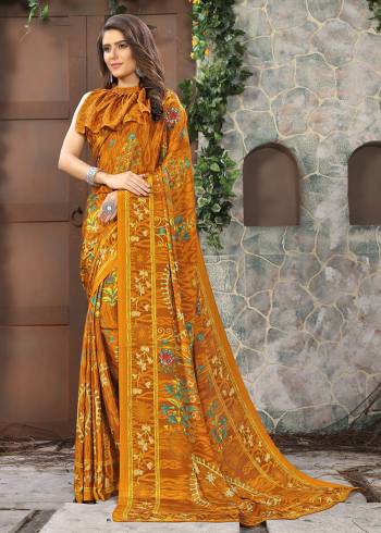 Celebrate This Festive Season In This Very Nyce Colored Saree Paired with Maching Blouse. This Saree and Blouse Are Crepe Silk Based Beautified With Detailed Fancy Print Saree. 