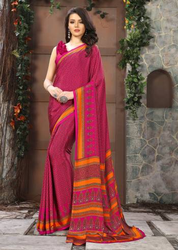 Celebrate This Festive Season In This Very Nyce Colored Saree Paired with Maching Blouse. This Saree and Blouse Are Crepe Silk Based Beautified With Detailed Fancy Print Saree. 