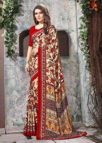 Celebrate This Festive Season In This Very Nyce Colored Saree Paired with Maching Blouse. This Saree and Blouse Are Crepe Silk Based Beautified With Detailed Fancy Print Saree. 